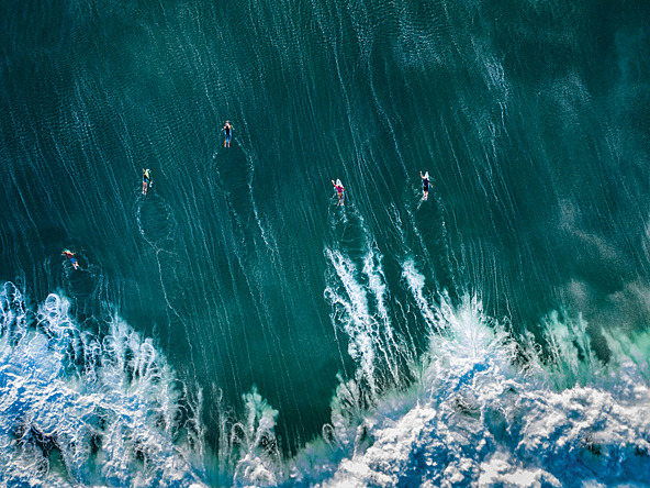 bird's eye view of surfers 