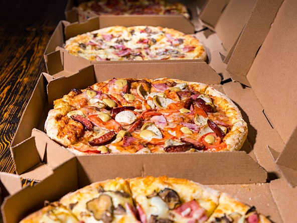 pizzas in boxes